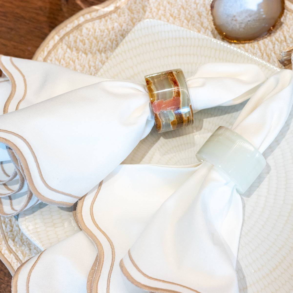Formal table setting with white Onyx stone napkin rings by Lulu Maison